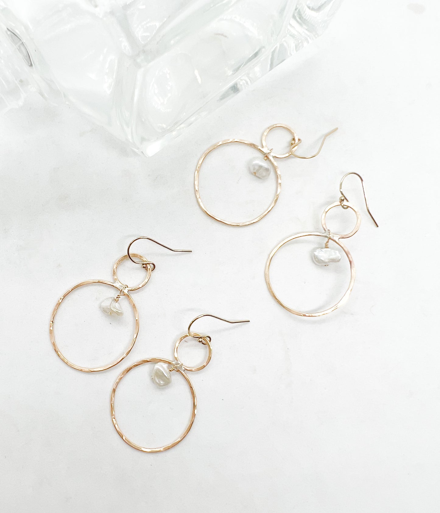 The Double Hoop with Swinging Pearl