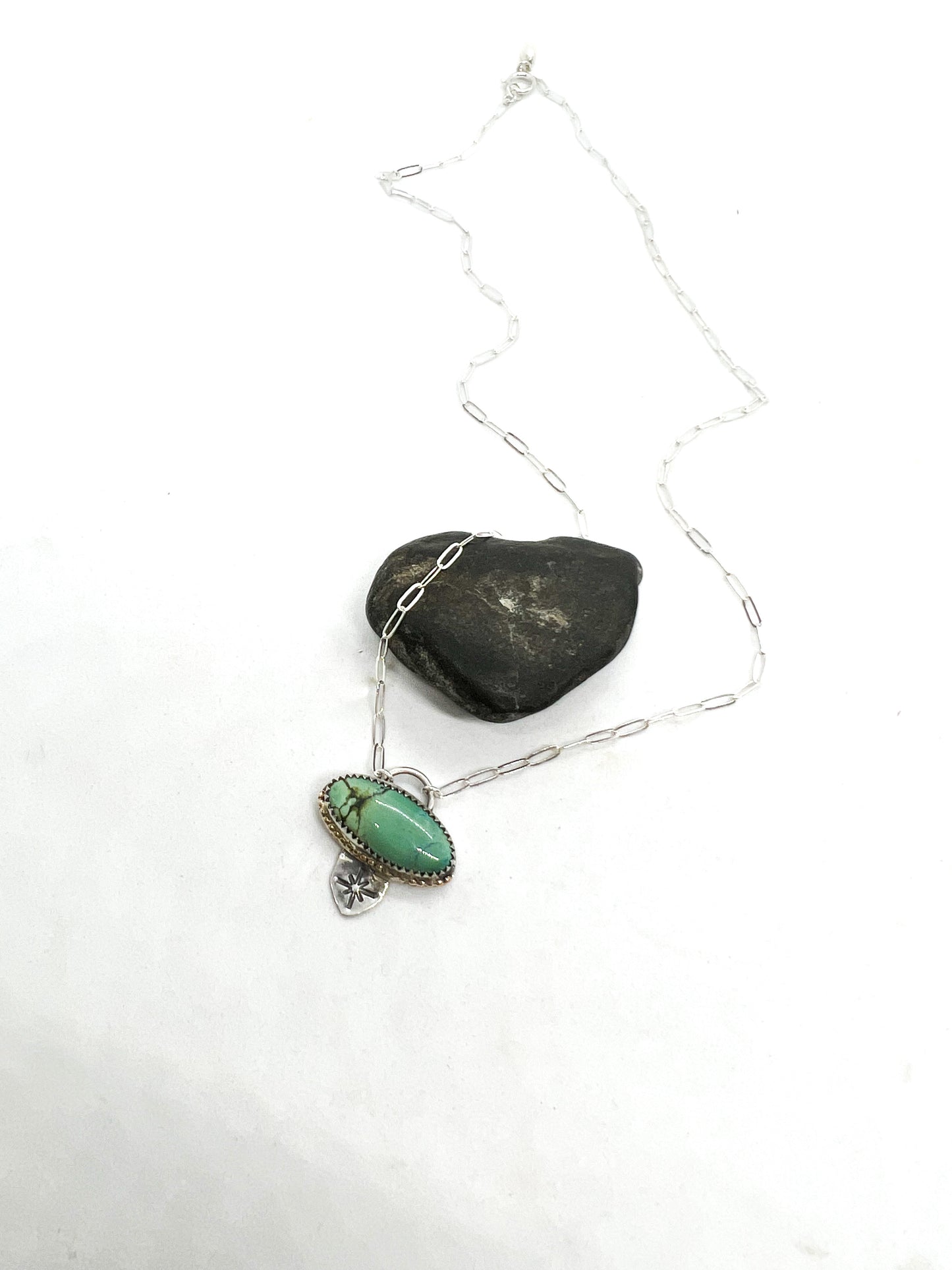 Turquoise Medallion with Star and Golden Halo