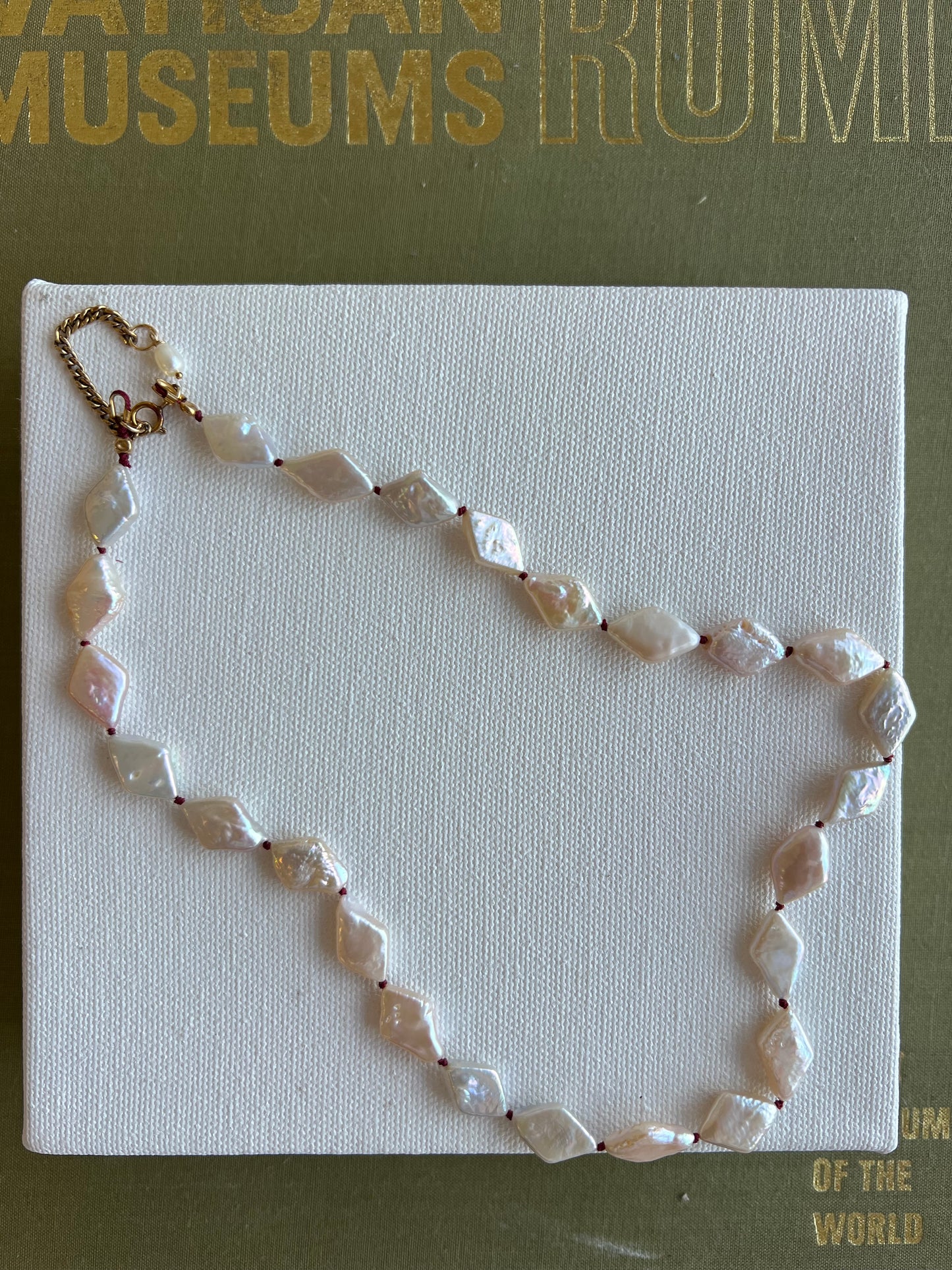 The Knot in Diamond Shape Pearls