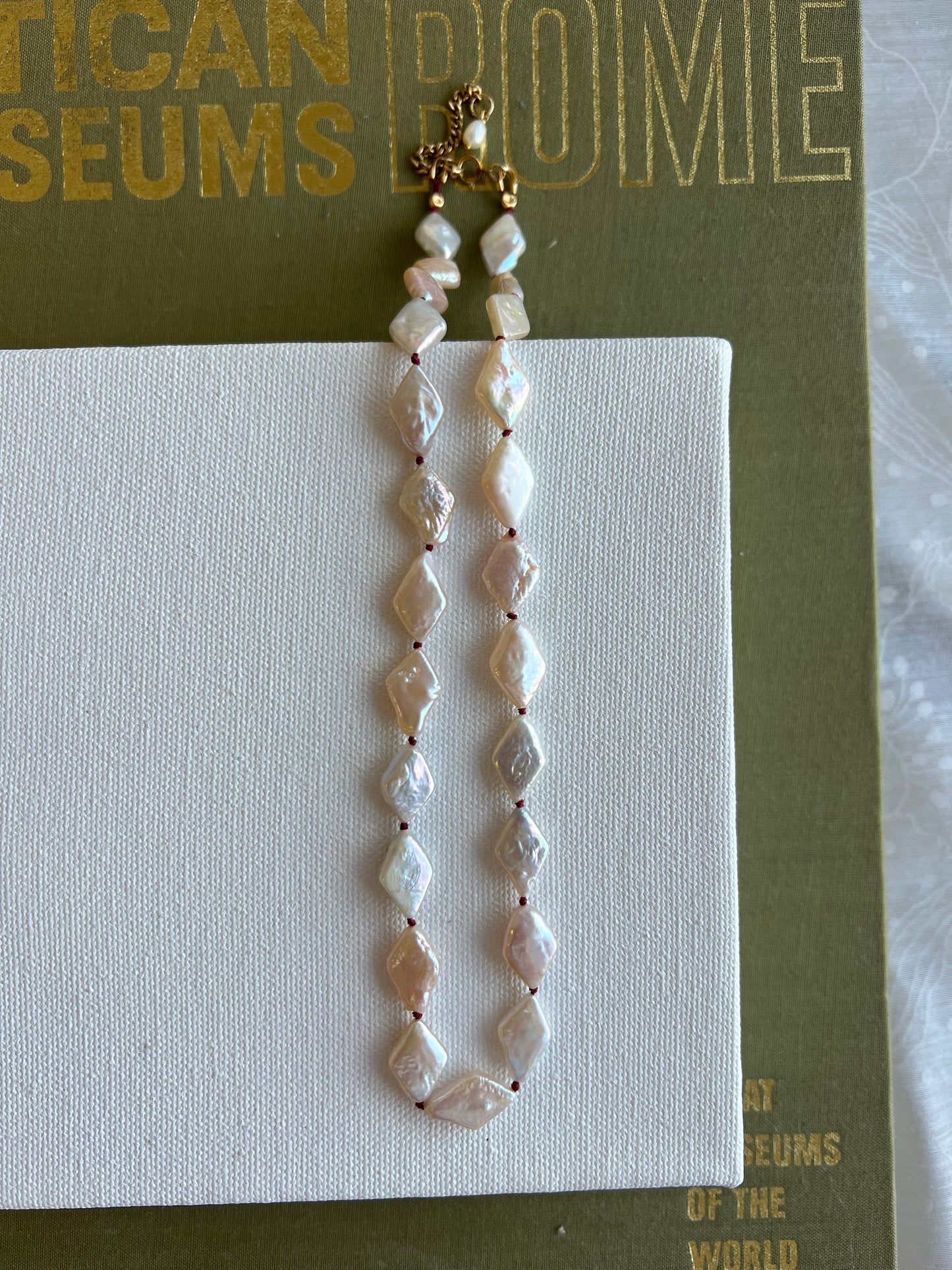 The Knot in Diamond Shape Pearls