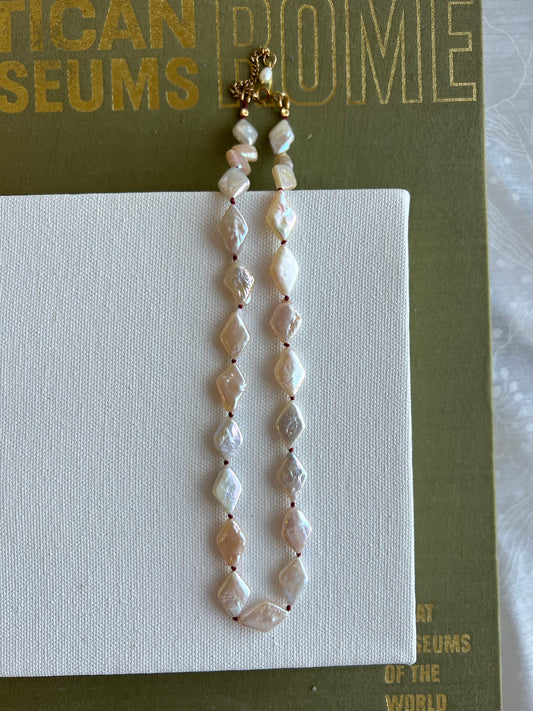 The Knot in Diamond Shape Pearls
